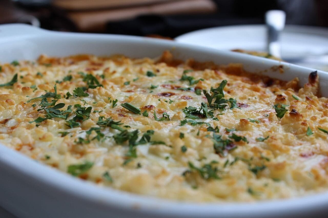 Suflê de bacalhau cremoso com cobertura gratinada que derrete na boca
